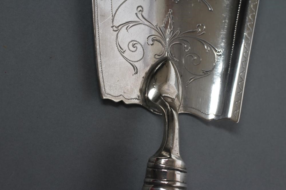 A LATE GEORGE III SILVER FISH SLICE Image