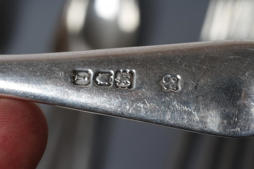 AN EDWARDIAN SILVER OLD ENGLISH PATTERN PART TABLE SERVICE Image