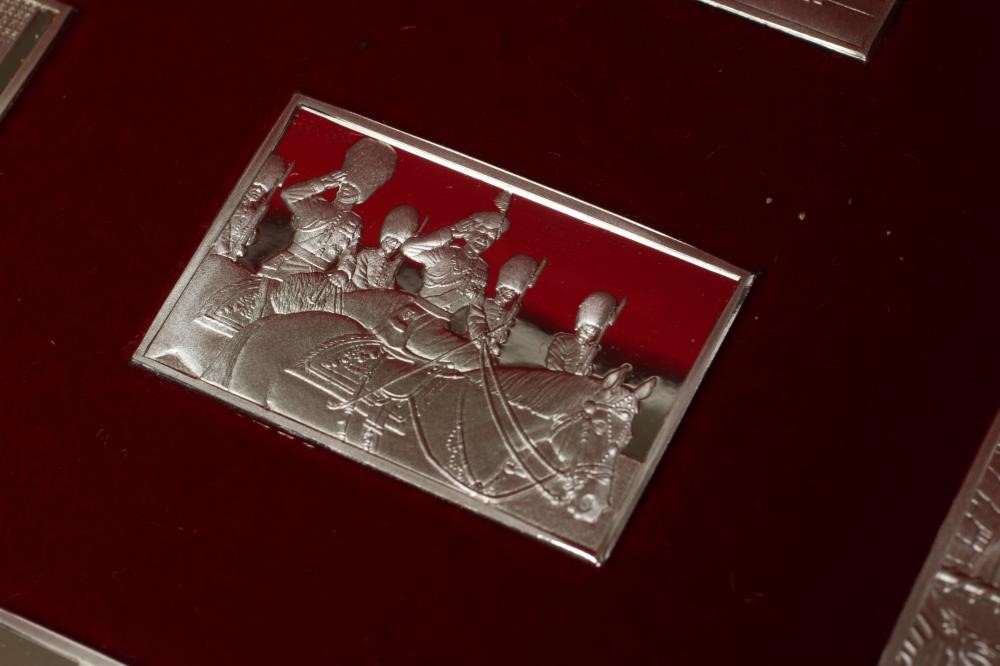 A SET OF TWENTY FIVE SILVER "STAMPS" celebrating 25 years of the reign of Queen Elizabeth II Image