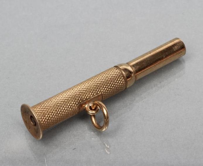 A 9CT GOLD CIGAR PIERCER Image