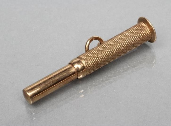 A 9CT GOLD CIGAR PIERCER Image