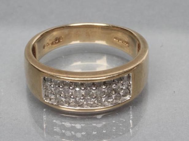 A DIAMOND BAND RING Image