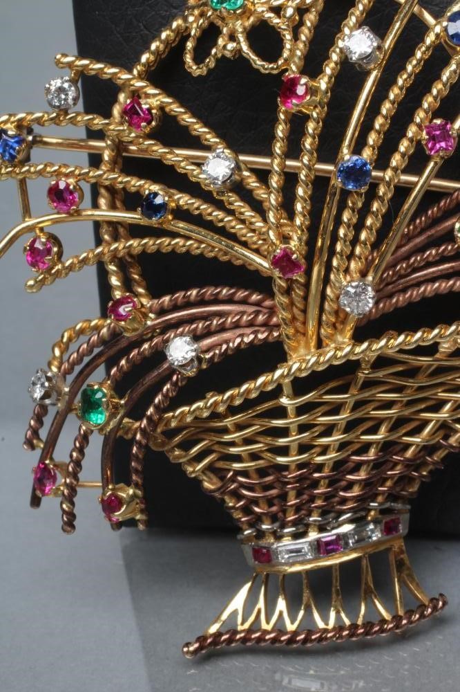 A MULTI-GEM SET BI-COLOUR BASKET BROOCH set with diamonds Image