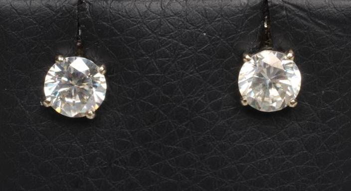 A PAIR OF SOLITAIRE MOISSANITE EAR STUDS on white metal posts (Est. plus 21% premium inc. VAT) Image