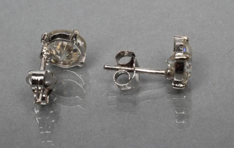 A PAIR OF SOLITAIRE MOISSANITE EAR STUDS on white metal posts (Est. plus 21% premium inc. VAT) Image