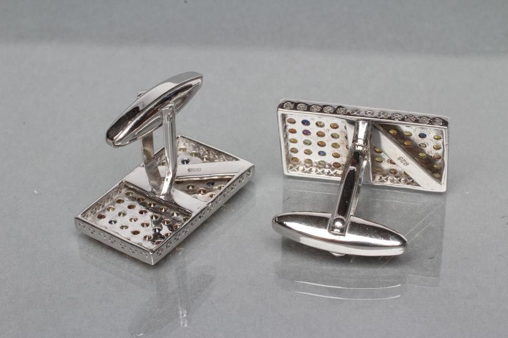 A PAIR OF SILVER CUFFLINKS Image