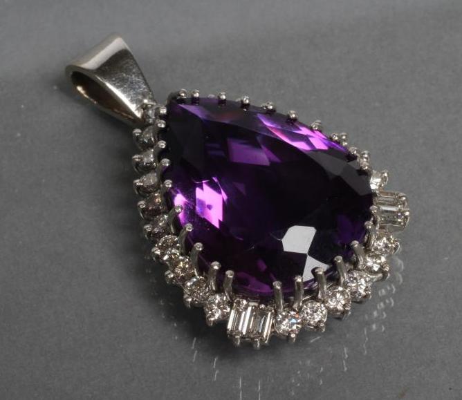 AN AMETHYST AND DIAMOND PENDANT Image