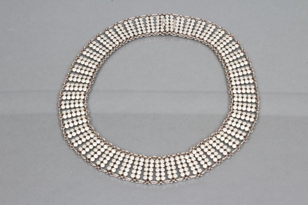 A NORWEGIAN SILVER AND WHITE ENAMEL COLLAR made up of fifty two pairs of ten white enamelled Image