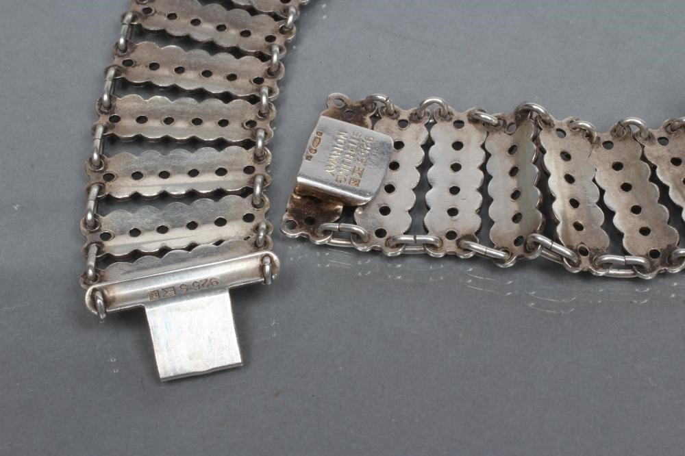 A NORWEGIAN SILVER AND WHITE ENAMEL COLLAR made up of fifty two pairs of ten white enamelled Image