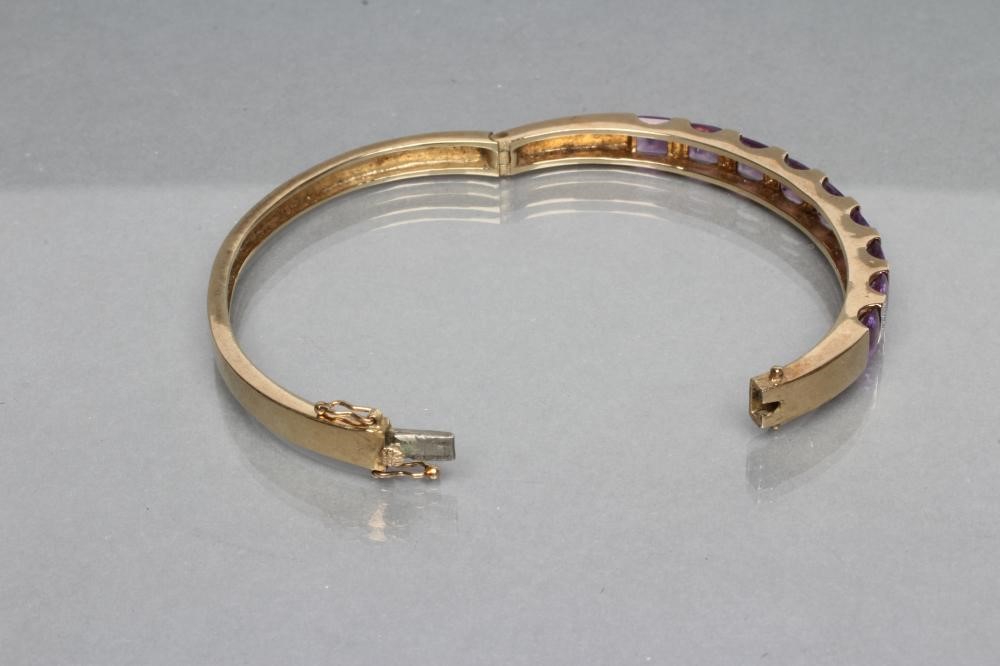 A STIFF HINGED BANGLE Image