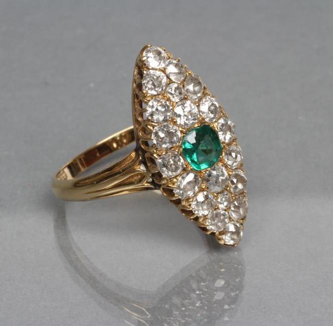 AN EMERALD AND DIAMOND DRESS RING Image