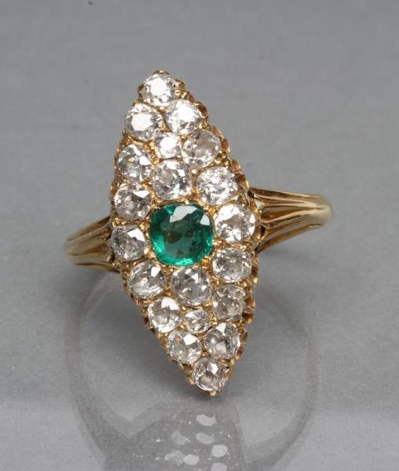 AN EMERALD AND DIAMOND DRESS RING Image