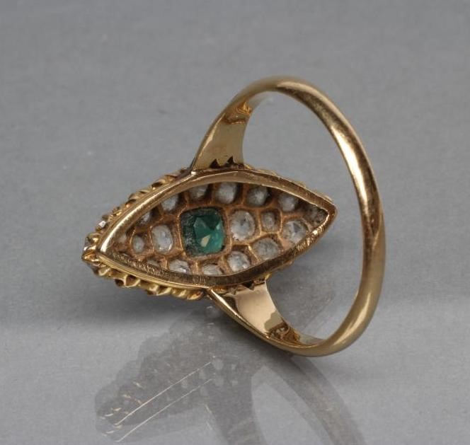 AN EMERALD AND DIAMOND DRESS RING Image