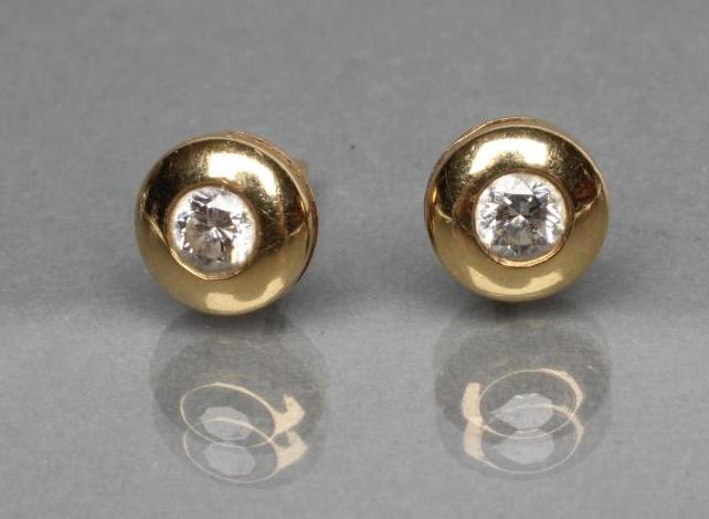 A PAIR OF DIAMOND SOLITAIRE STUD EARRINGS Image