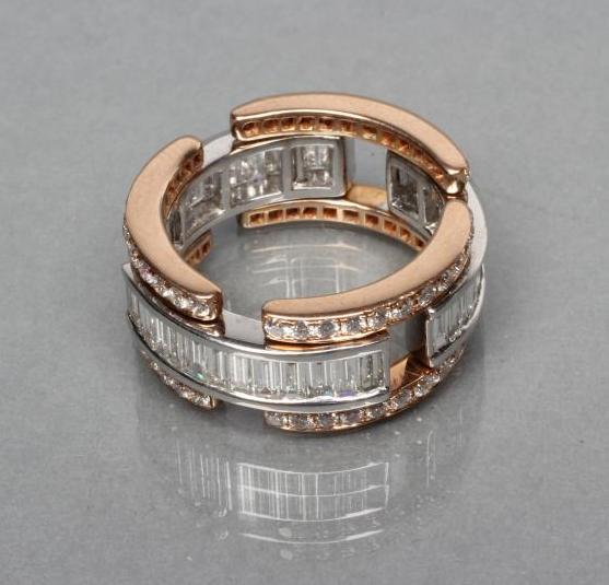 AN UNUSUAL HINGED DIAMOND RING Image