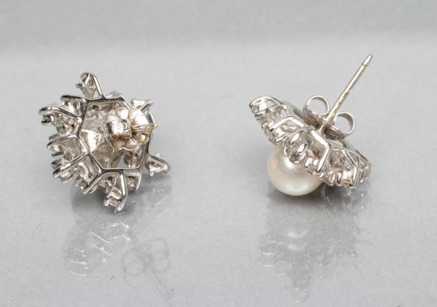 A PAIR OF DIAMOND AND PEARL STUD EARRINGS Image