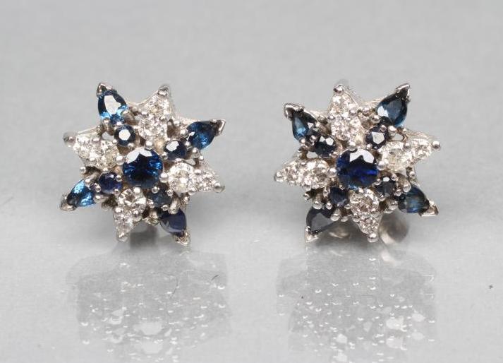 A PAIR OF SAPPHIRE AND DIAMOND STAR CLUSTER EAR STUDS Image