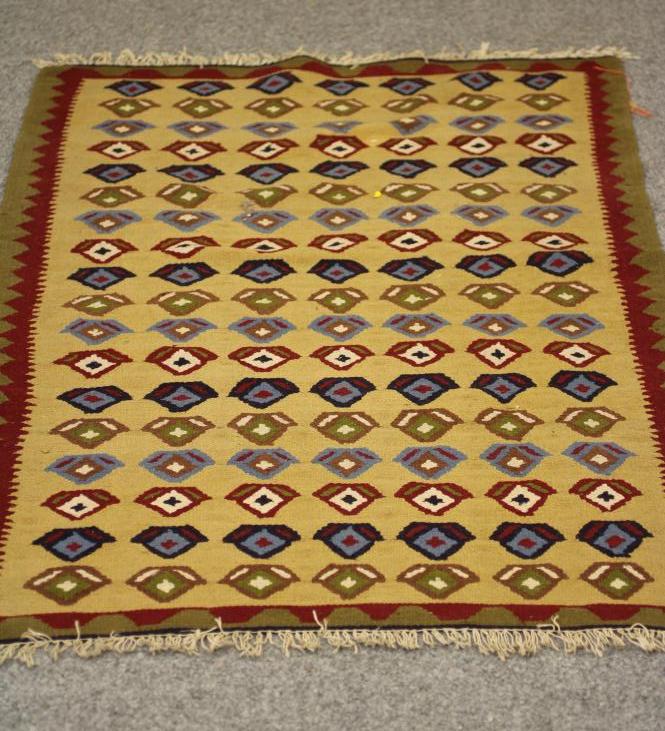 A SMALL PERSIAN TRIBAL RUG Image