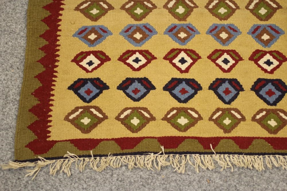 A SMALL PERSIAN TRIBAL RUG Image