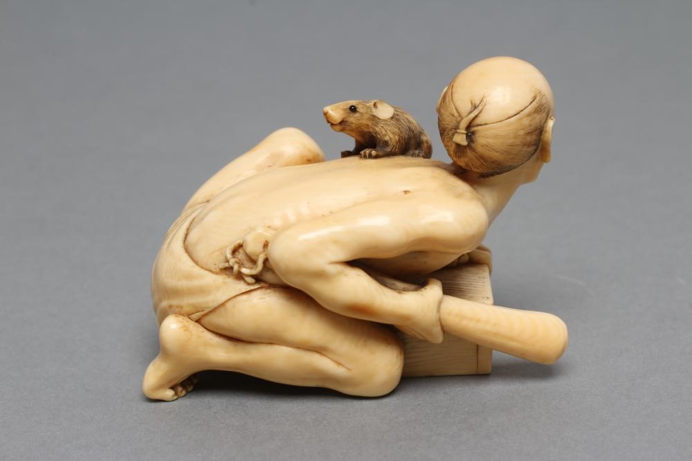 A JAPANESE IVORY SMALL OKIMONO NETSUKE Image