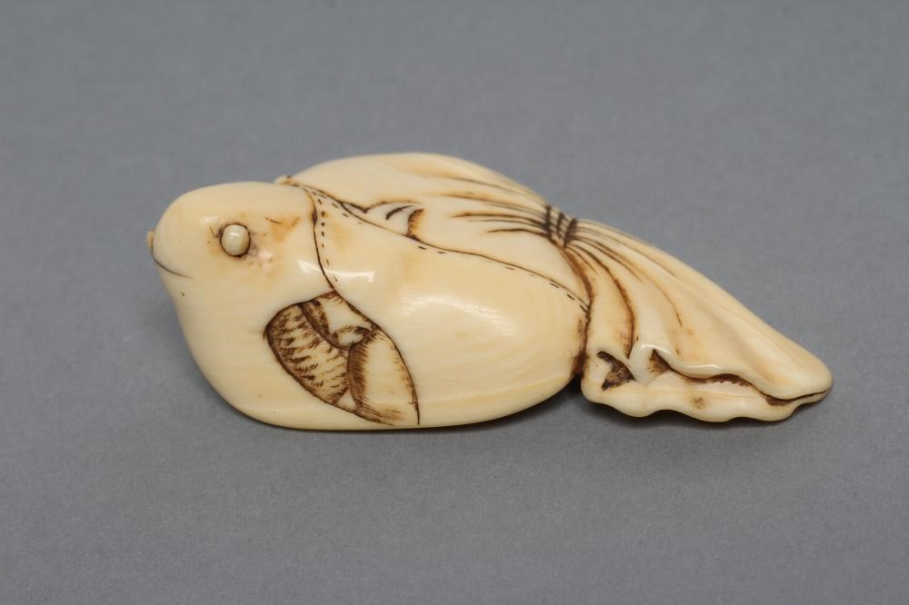 A JAPANESE IVORY NETSUKE Image