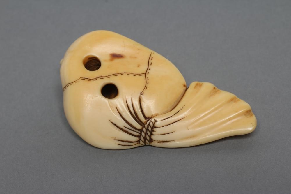 A JAPANESE IVORY NETSUKE Image