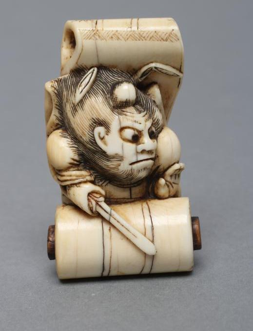 A JAPANESE IVORY NETSUKE Image