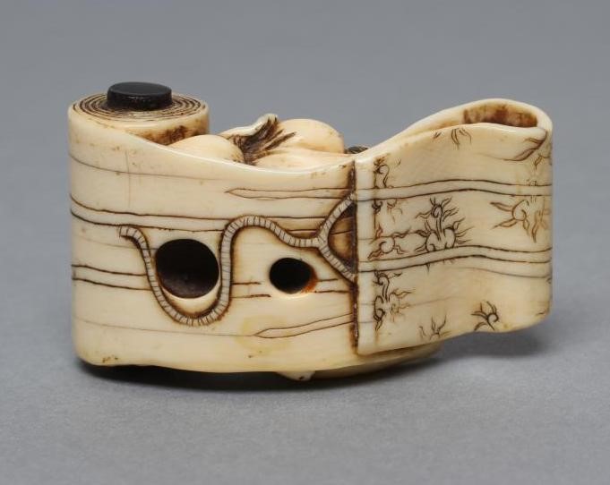 A JAPANESE IVORY NETSUKE Image