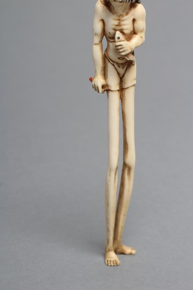 A JAPANESE IVORY OKIMONO NETSUKE Image