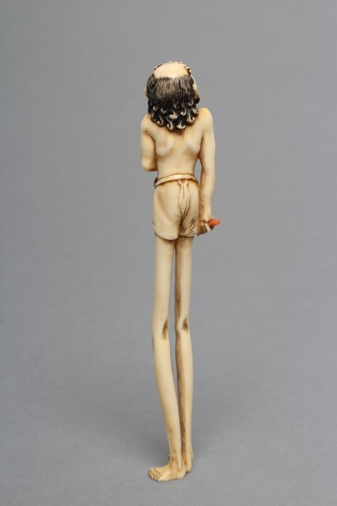 A JAPANESE IVORY OKIMONO NETSUKE Image