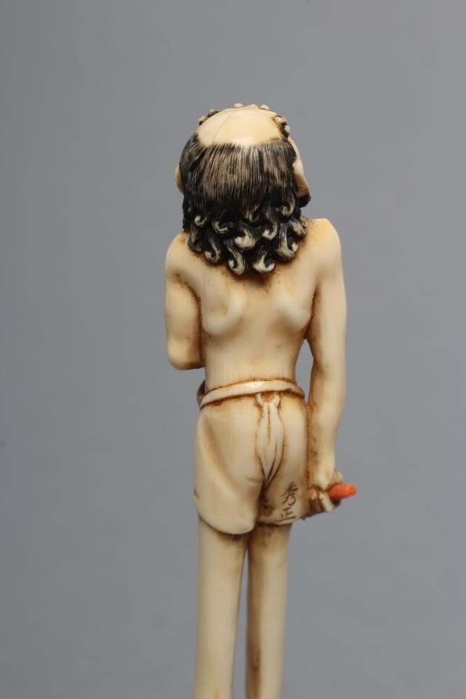 A JAPANESE IVORY OKIMONO NETSUKE Image