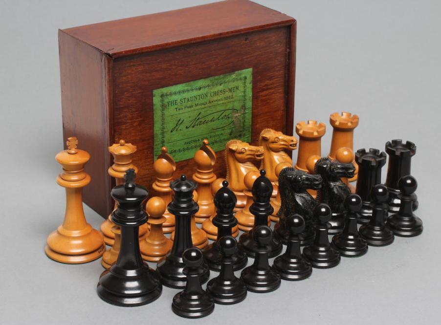 A VICTORIAN JAQUES BOXWOOD AND EBONY STAUNTON CHESS SET Image