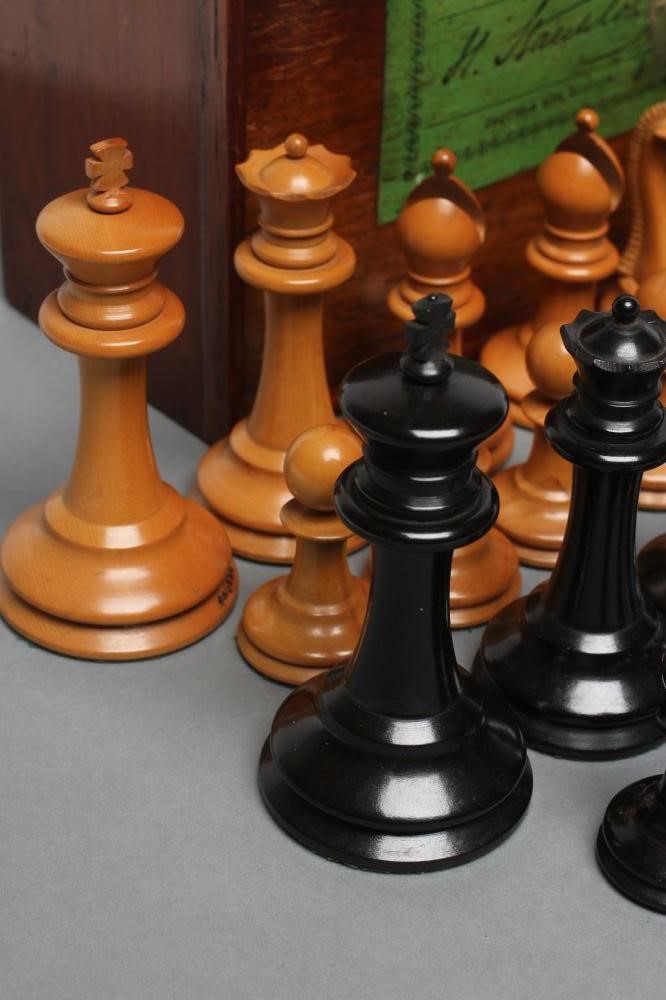 A VICTORIAN JAQUES BOXWOOD AND EBONY STAUNTON CHESS SET Image