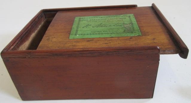 A VICTORIAN JAQUES BOXWOOD AND EBONY STAUNTON CHESS SET Image