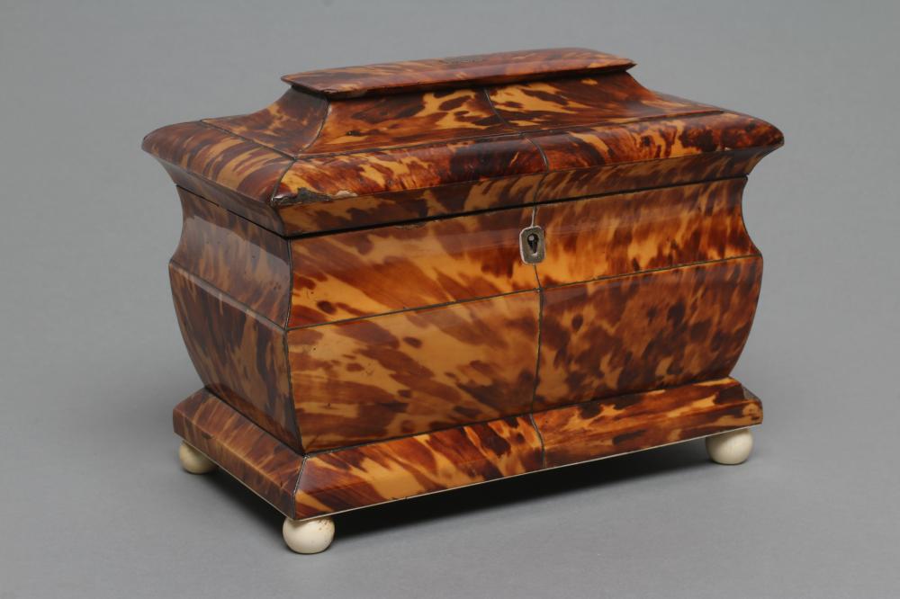A VICTORIAN TORTOISESHELL TEA CADDY of sarcophagus form Image