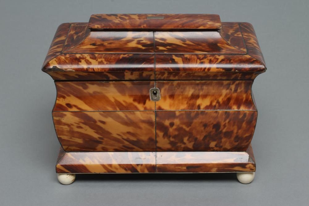 A VICTORIAN TORTOISESHELL TEA CADDY of sarcophagus form Image