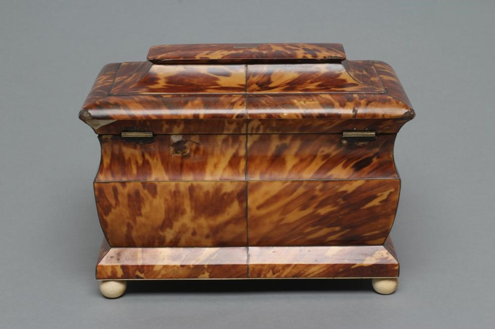 A VICTORIAN TORTOISESHELL TEA CADDY of sarcophagus form Image