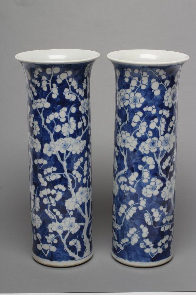 A PAIR OF CHINESE PORCELAIN SLEEVE VASES painted in underglaze blue with cracked ice and prunus Image