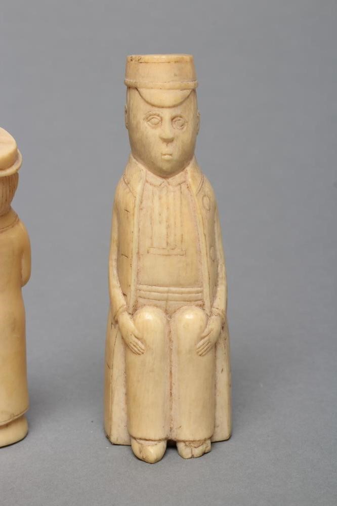 TWO CARVED IVORY FIGURES Image