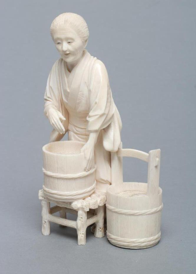 A JAPANESE IVORY FIGURE Image