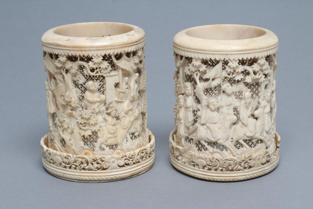 A PAIR OF CHINESE IVORY VASES of cylindrical form Image