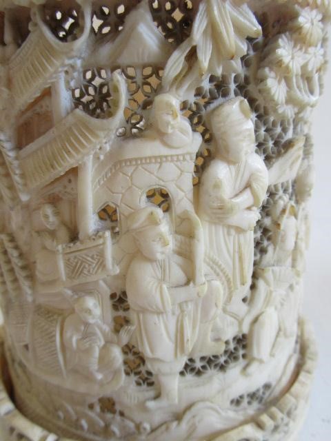 A PAIR OF CHINESE IVORY VASES of cylindrical form Image