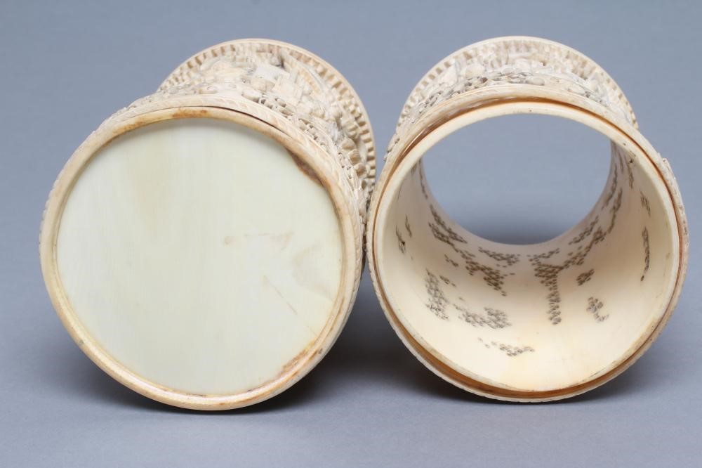A PAIR OF CHINESE IVORY VASES of cylindrical form Image