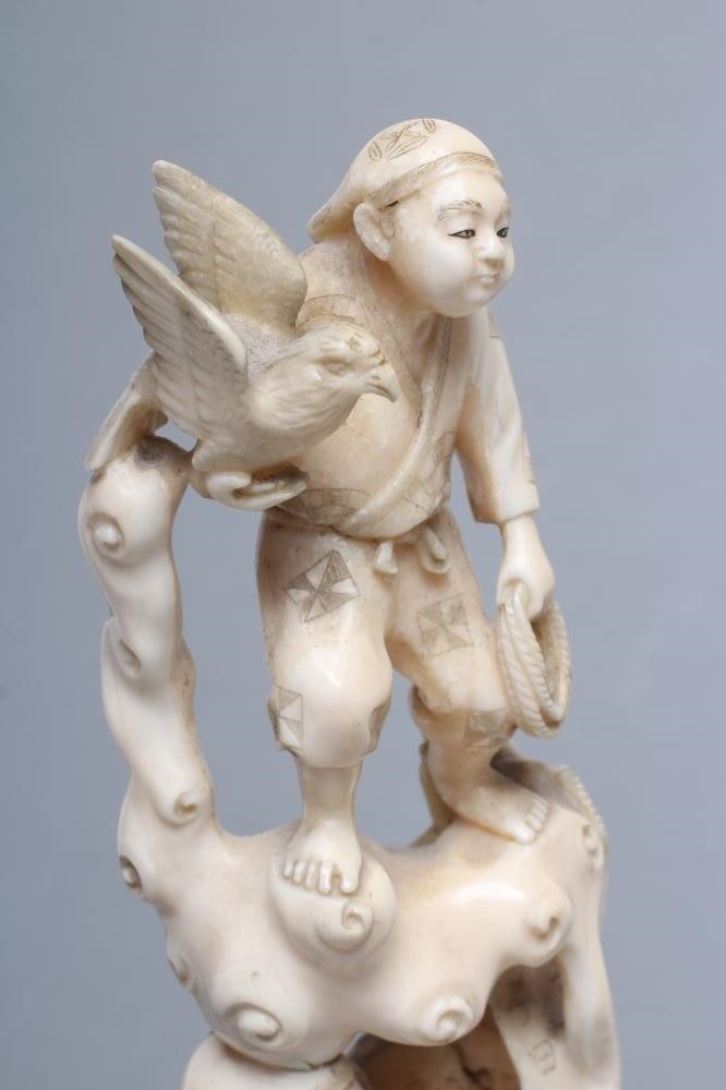 A JAPANESE IVORY ONE PIECE OKIMONO Image