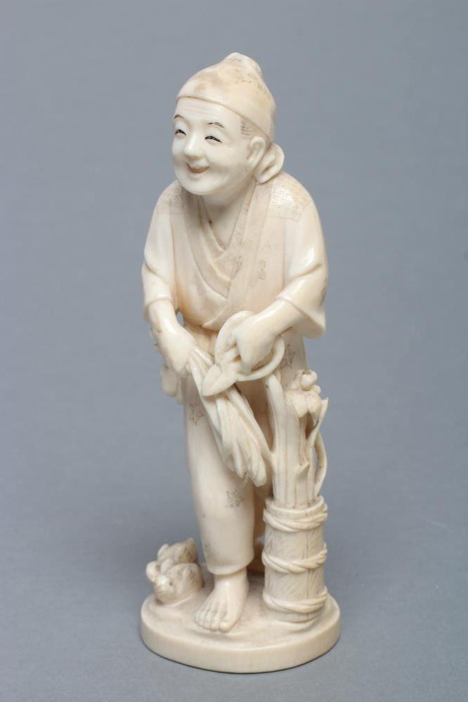 A JAPANESE IVORY OKIMONO Image