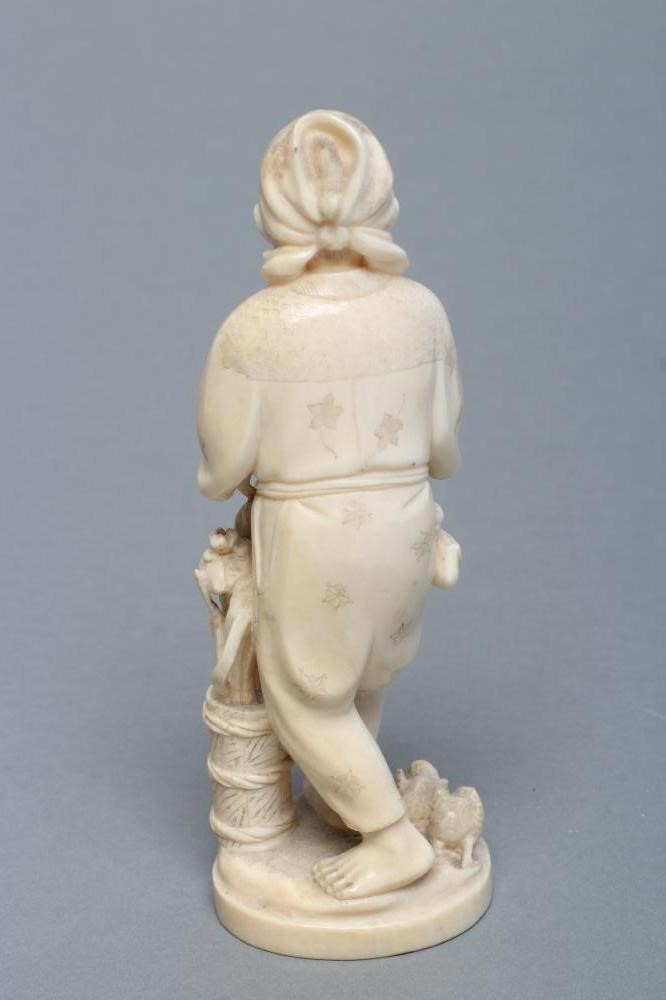 A JAPANESE IVORY OKIMONO Image