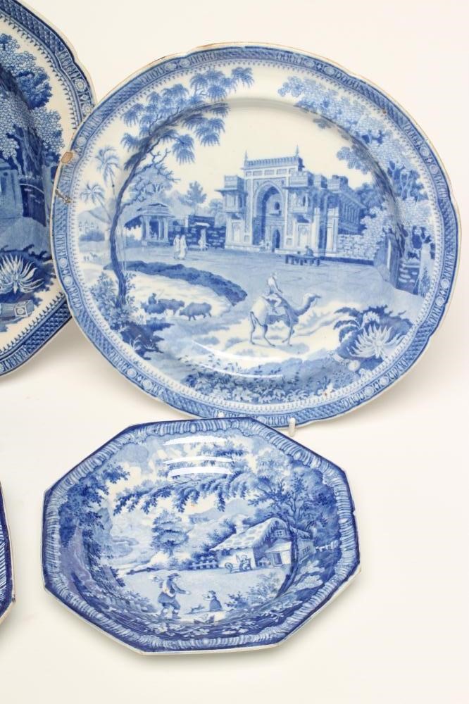A PAIR OF BRAMELD PEARLWARE "RETURNING WOODMAN" PATTERN BLUE AND WHITE TEA PLATES Image