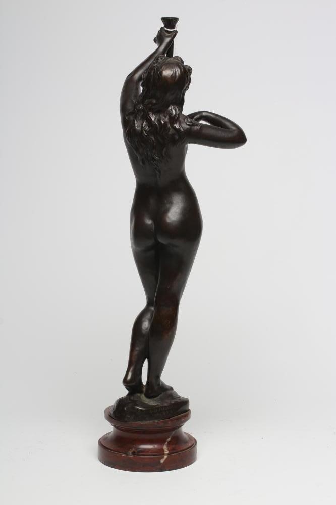 A BRONZE FIGURAL TABLE LAMP Image