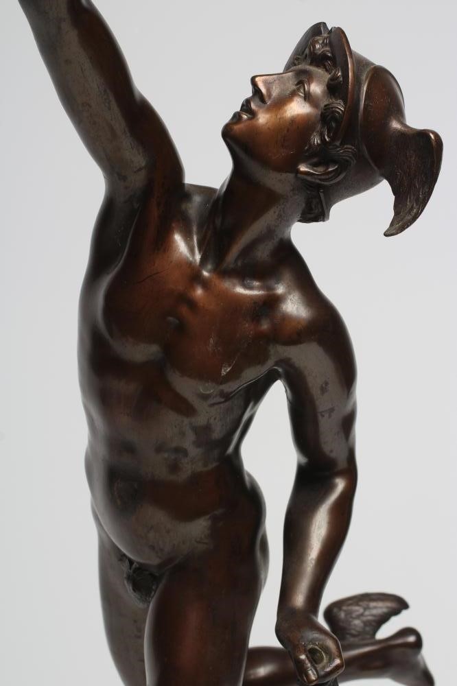 A BRONZE FIGURAL TABLE LAMP modelled as Mercury holding aloft a torch Image