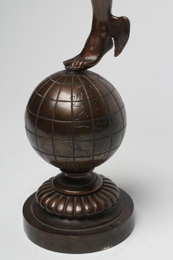 A BRONZE FIGURAL TABLE LAMP modelled as Mercury holding aloft a torch Image